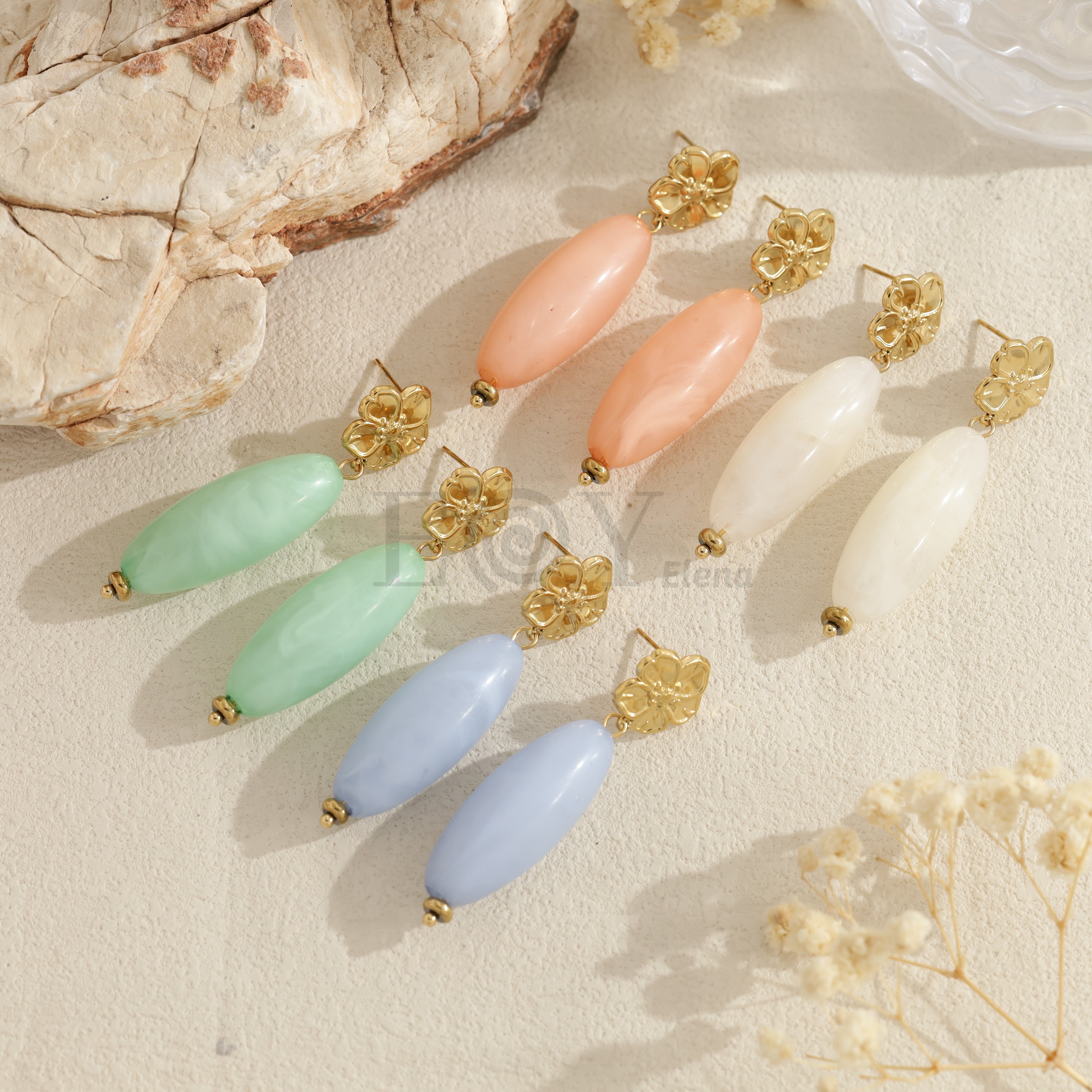 Pendientes largos con flor y pieza ovalada