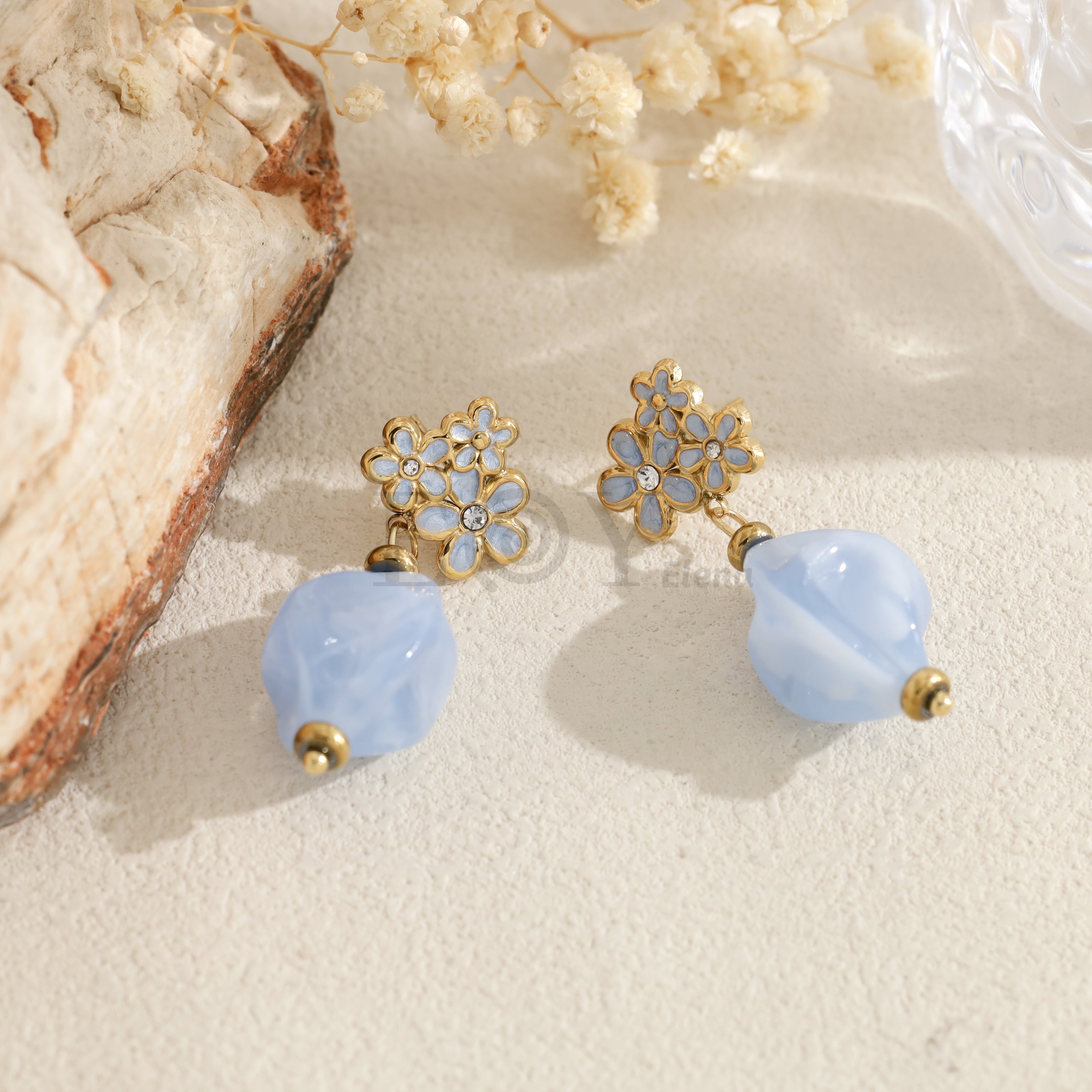 Pendientes flor con pieza ovalada