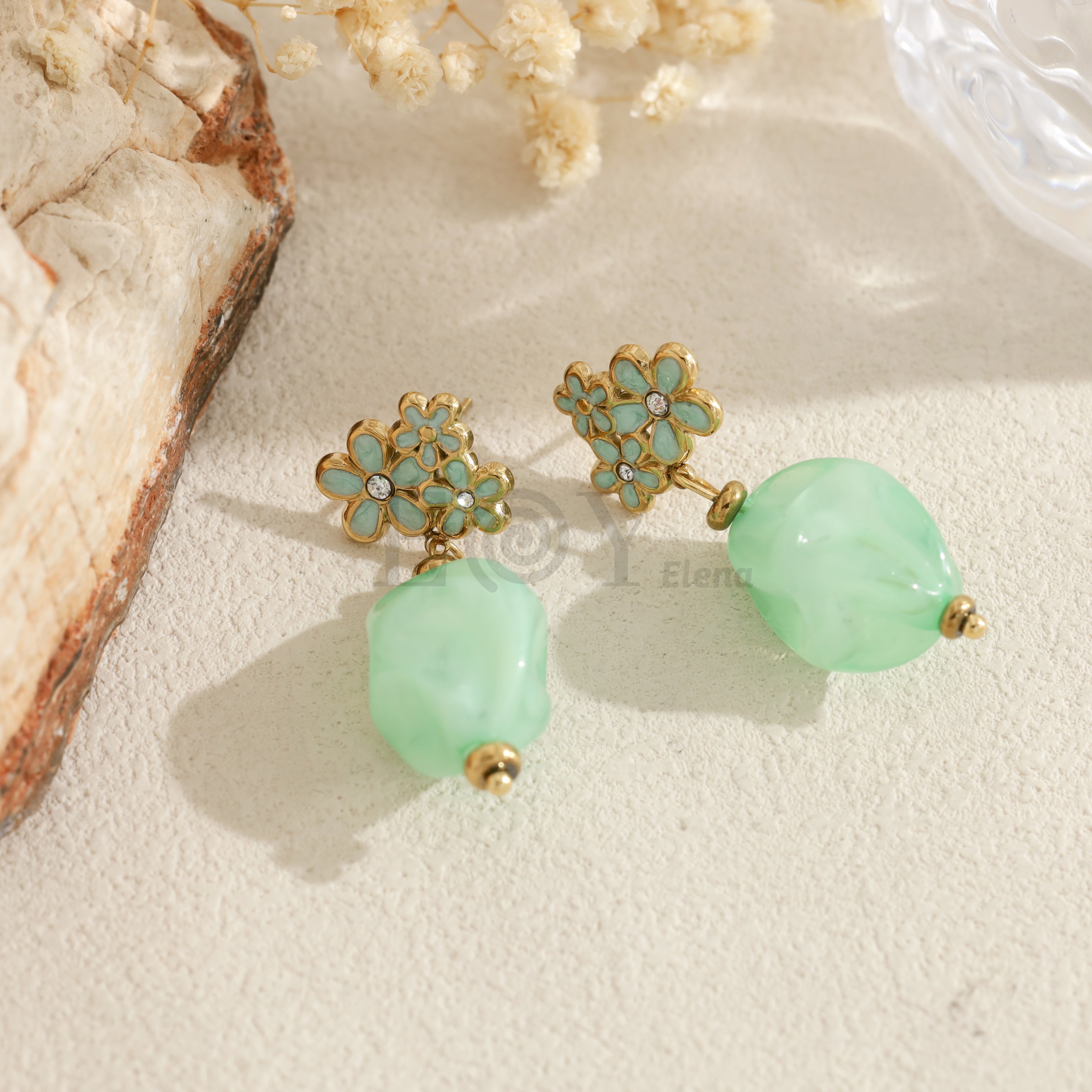 Pendientes flor con pieza ovalada