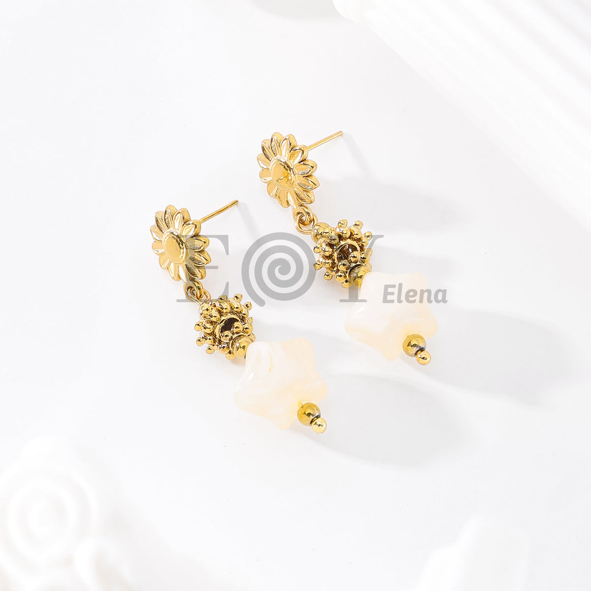 Pendientes chapa flor con piedra