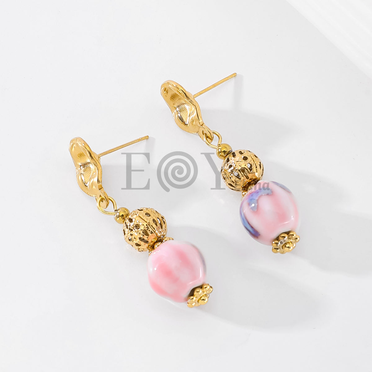 Pendientes óvalo texturizado chapa y piedra color