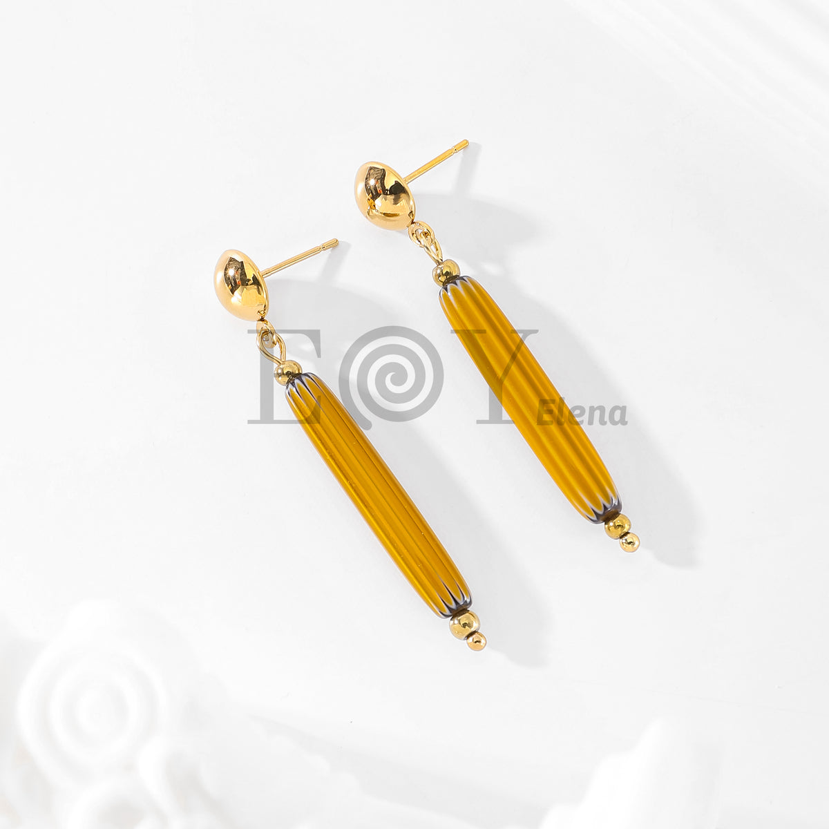 Pendientes con bastón color