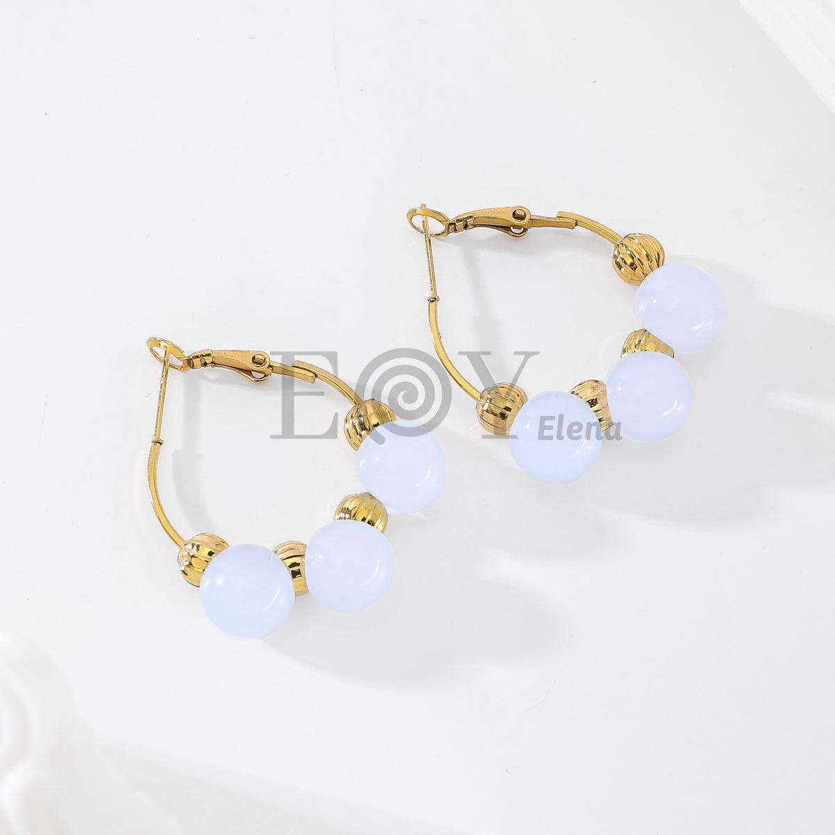 Pendientes de aro con piedras redondas