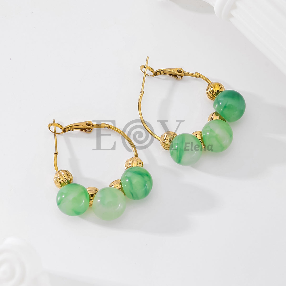Pendientes de aro con piedras redondas
