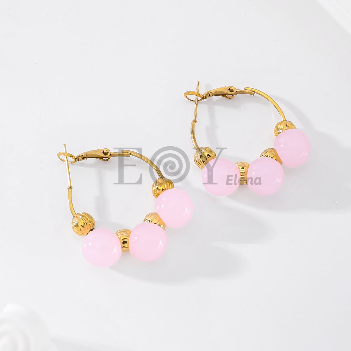 Pendientes de aro con piedras redondas