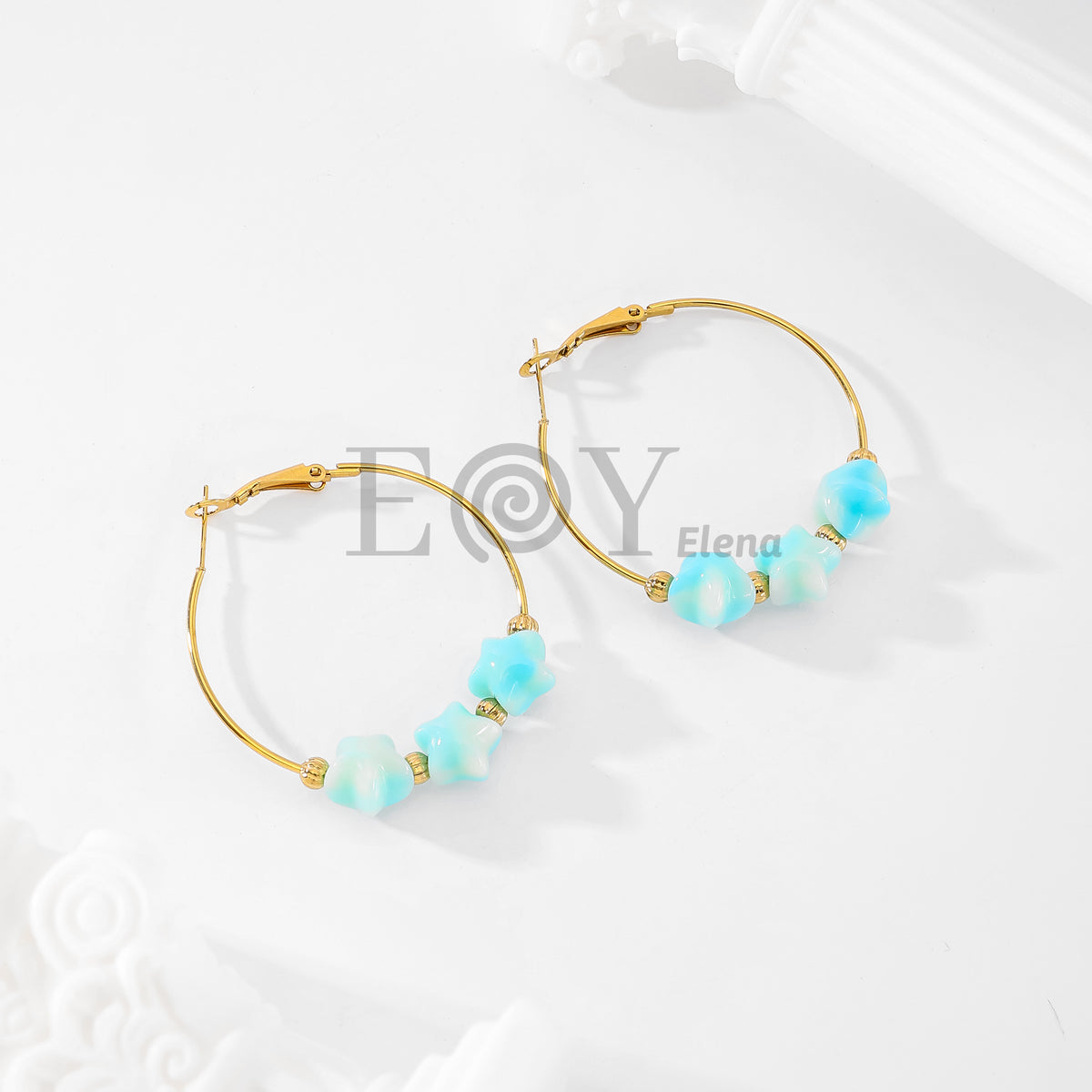 Pendientes aro con estrellas color