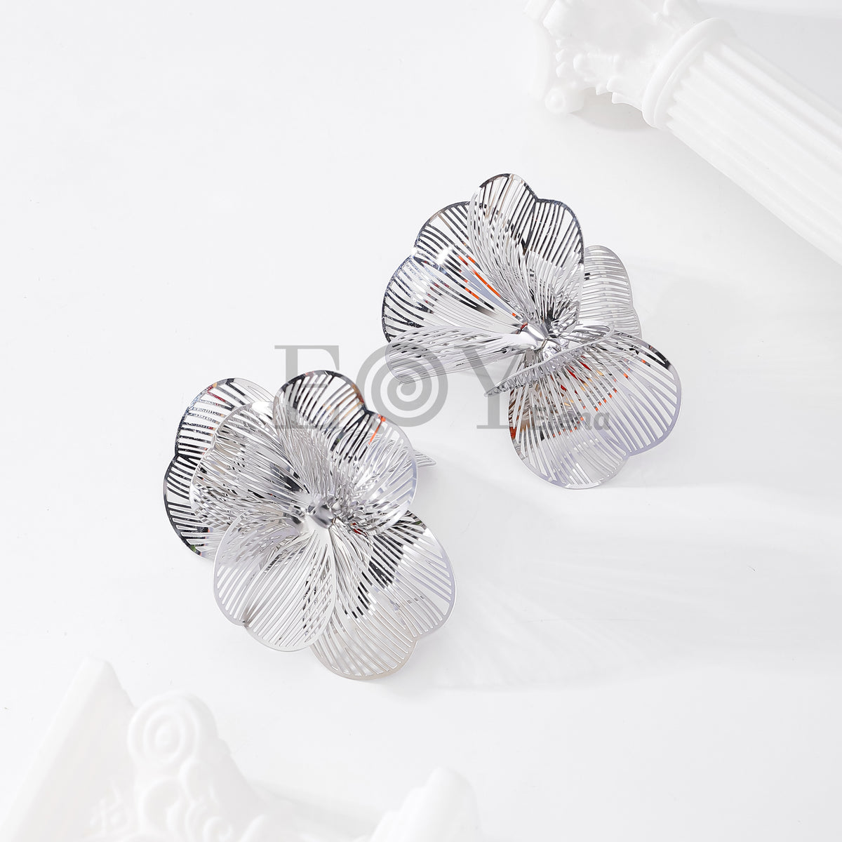 Pendientes flor acero