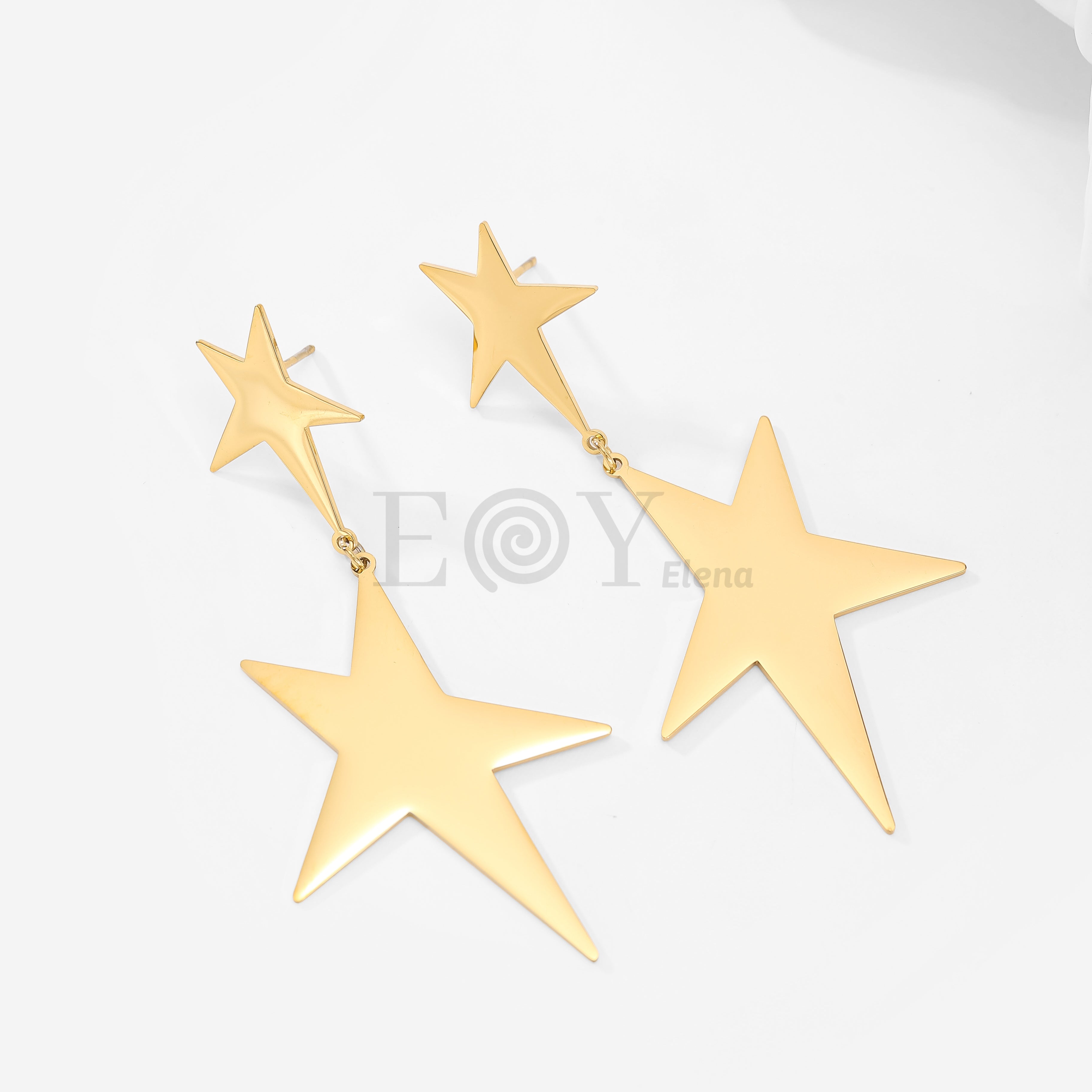 Pendientes doble estrella alargada mate