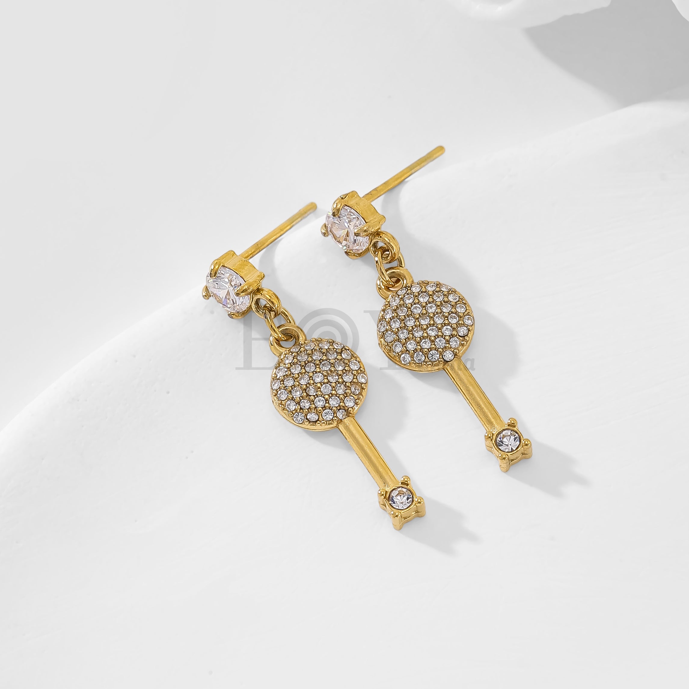 Pendientes de circonita y llave