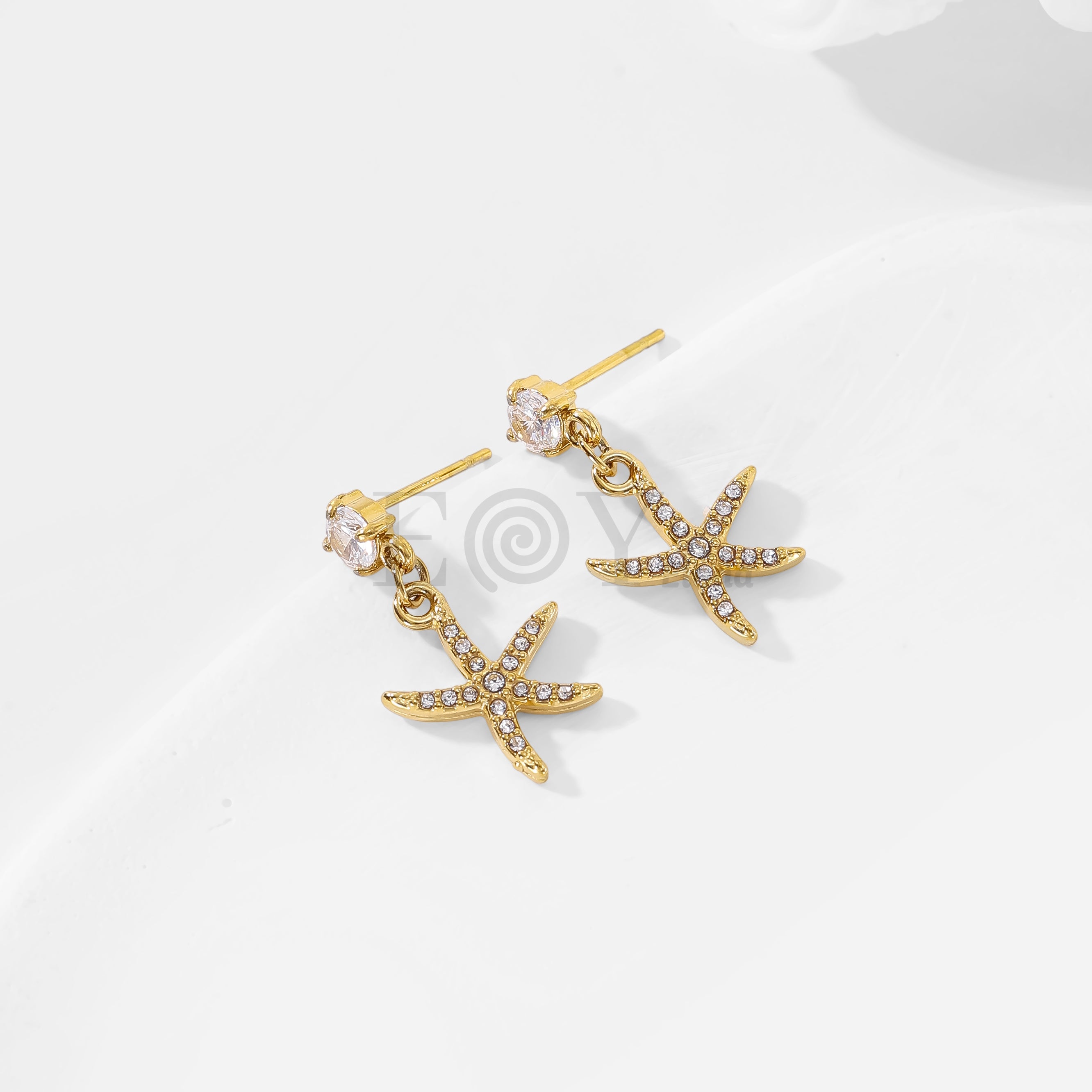 Pendientes de circonita y estrella de mar