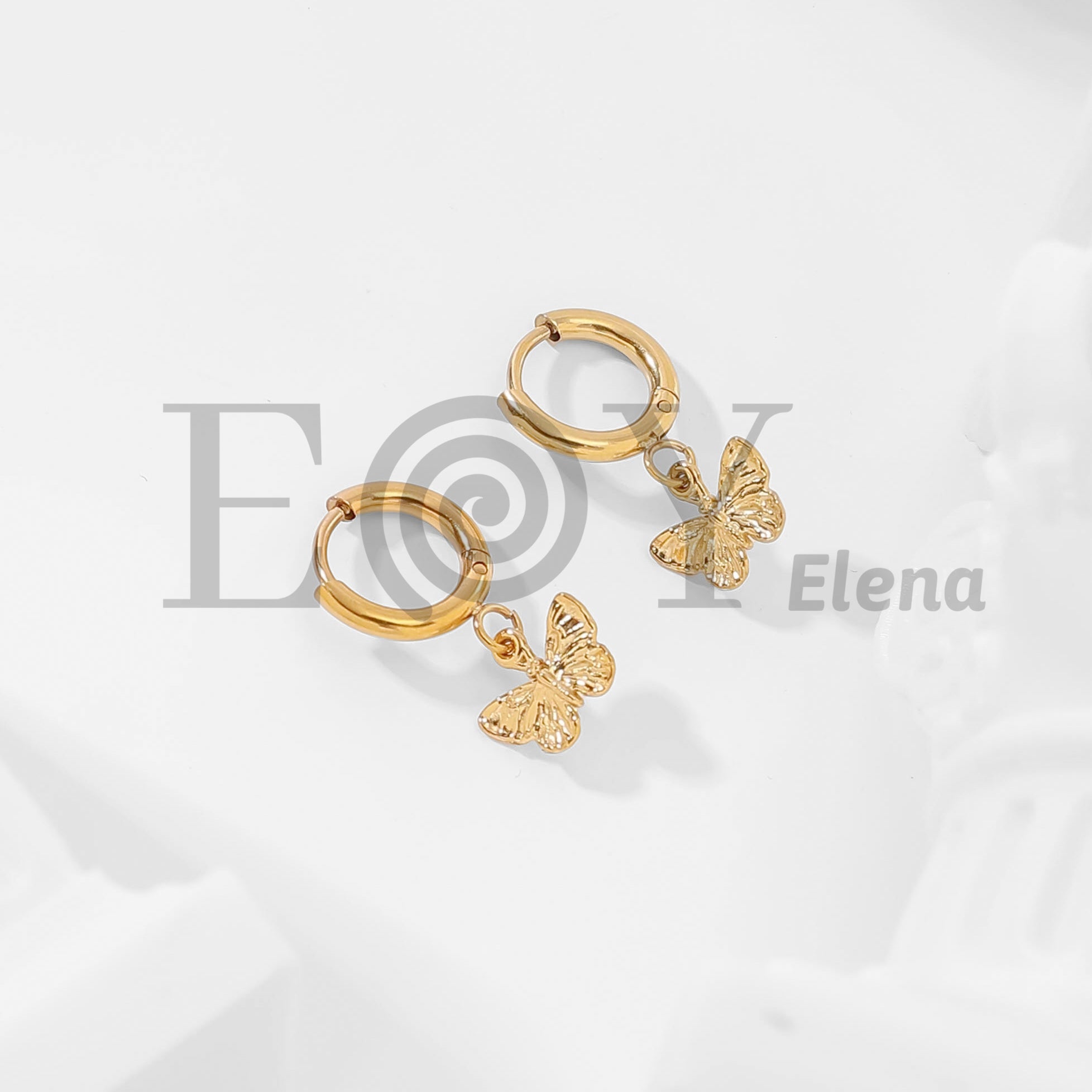 Pendientes de aro con colgante de mariposa