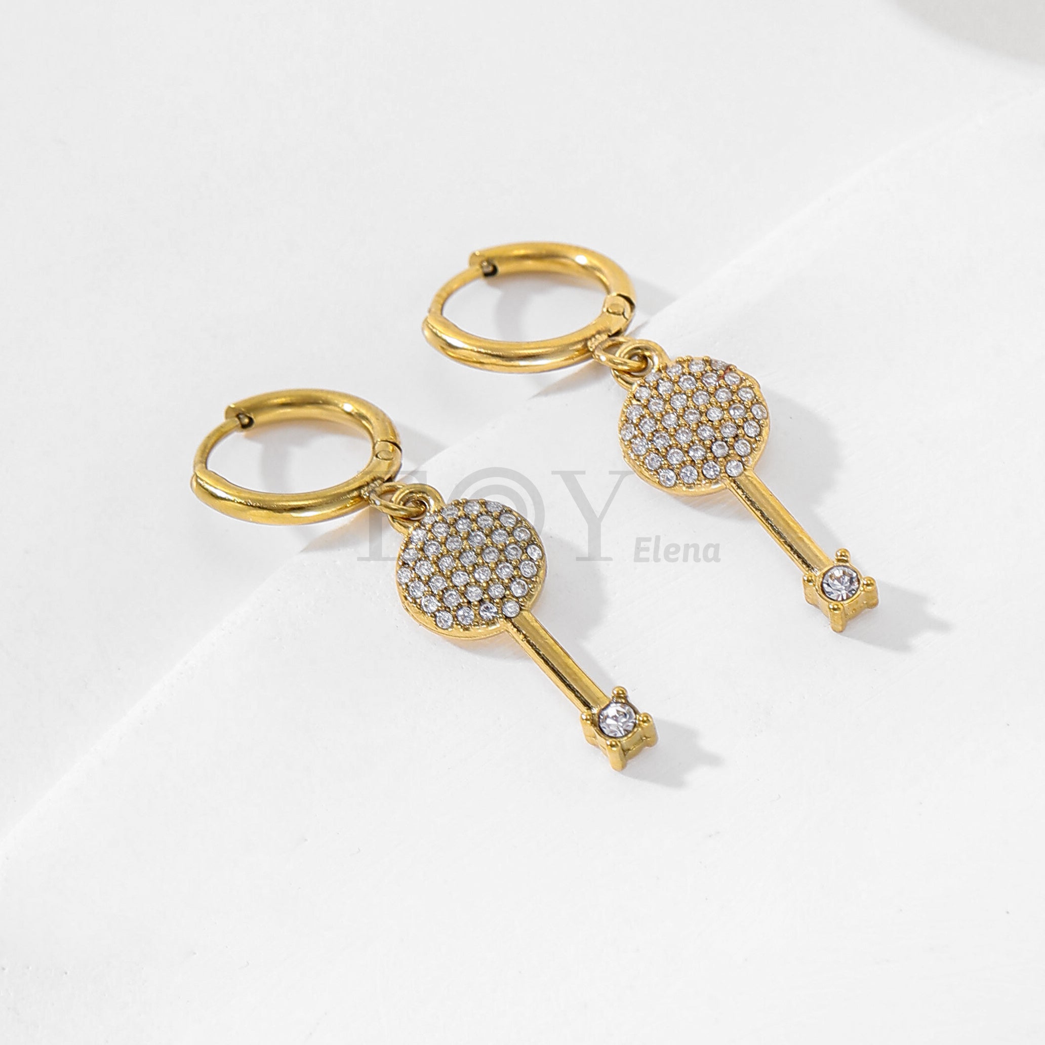 Pendientes de aro con llave de circonitas