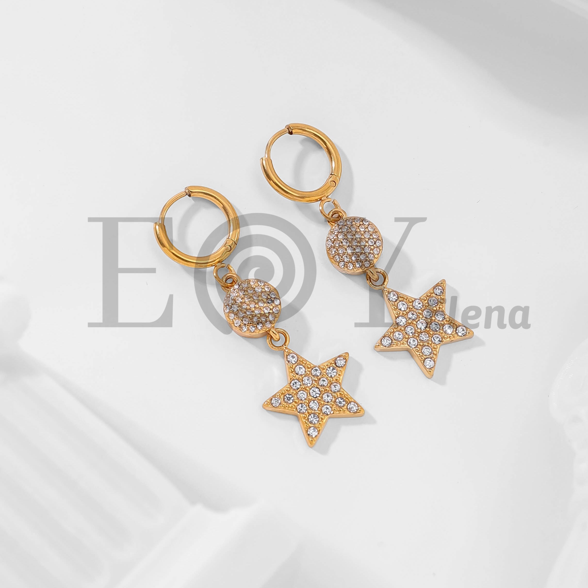 Pendientes de aro con colgante de estrella y circonitas
