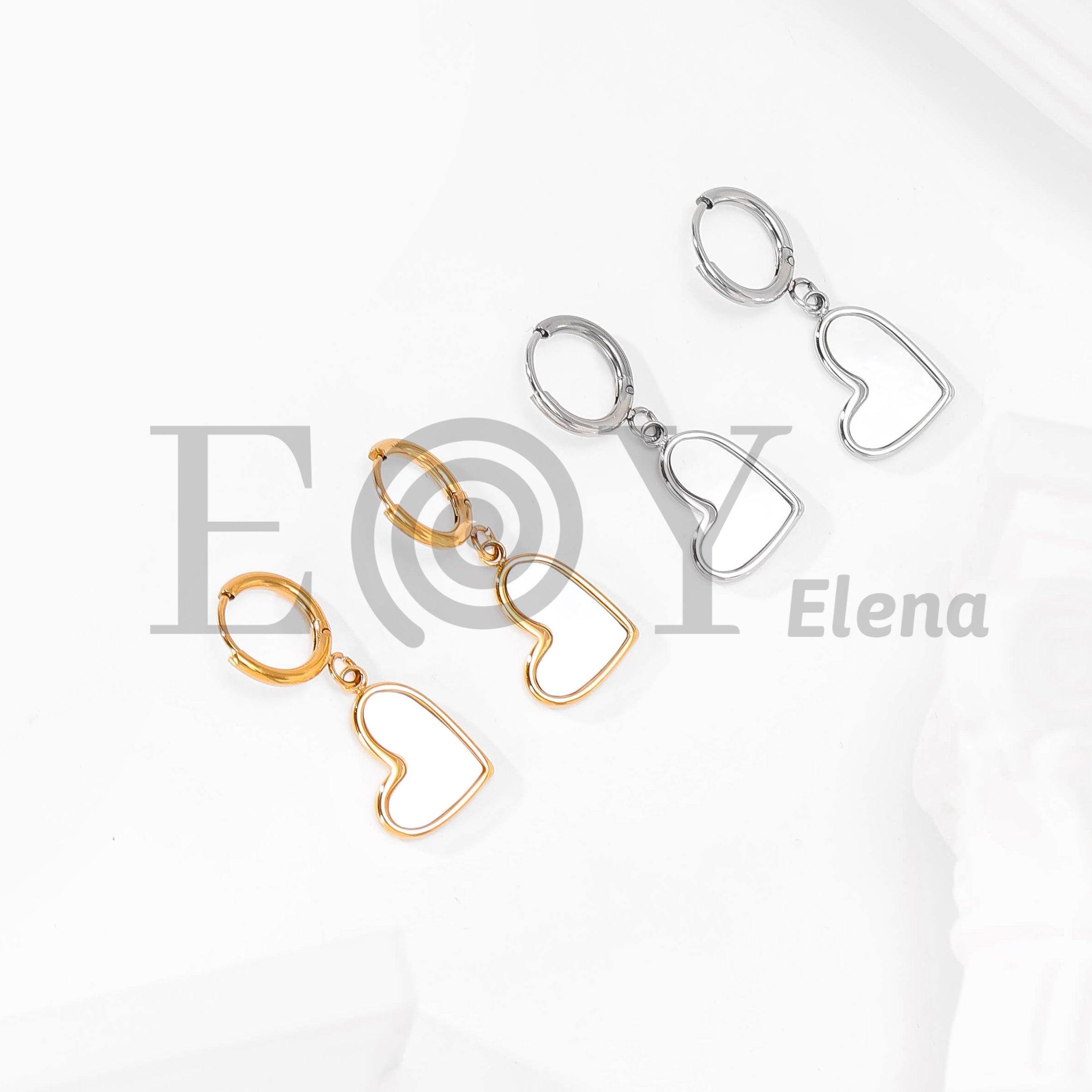 Pendientes corazón con interior blanco