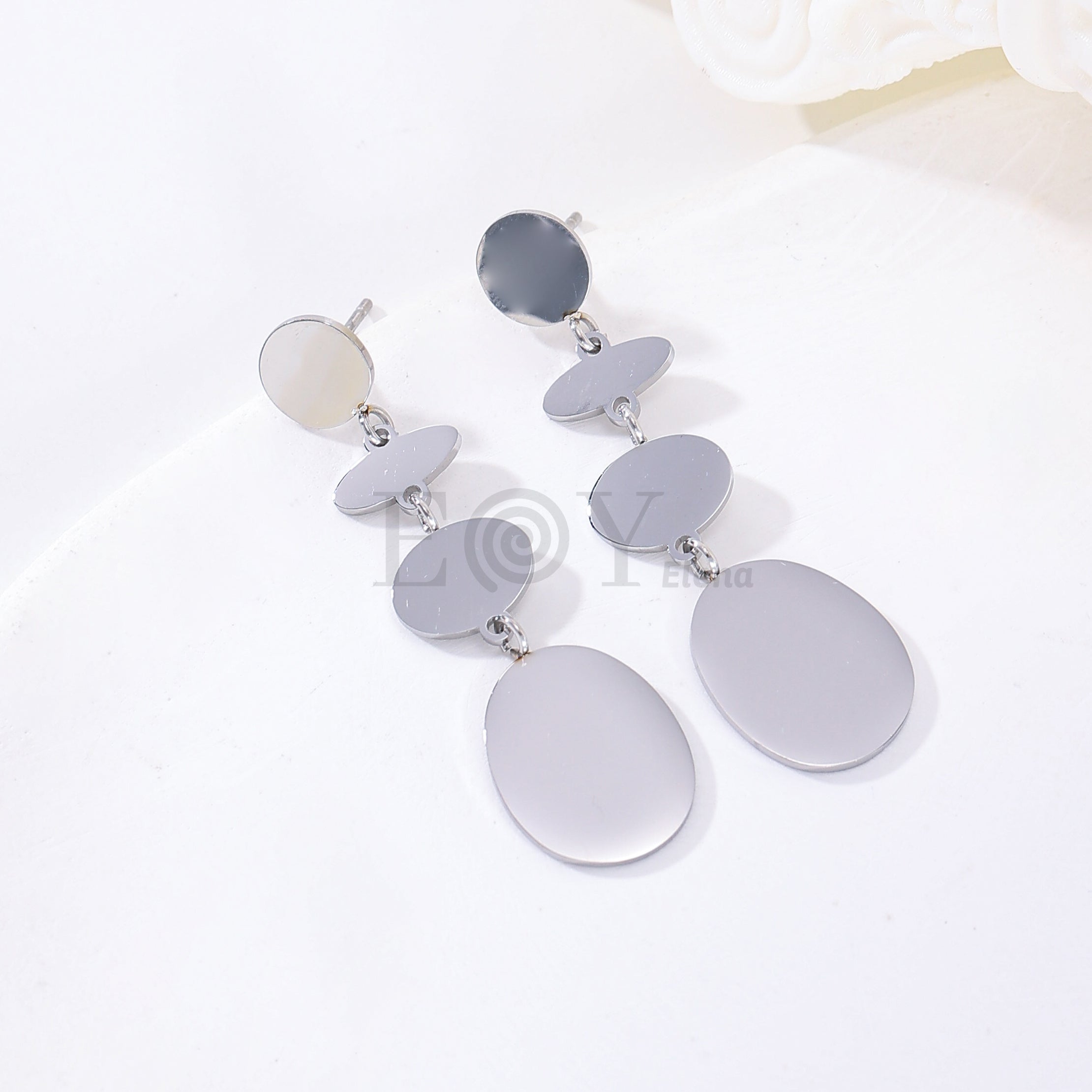 Pendientes largos cuatro chapas