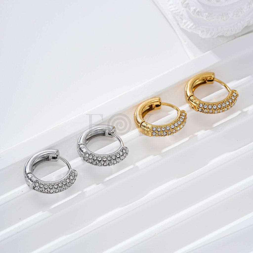 Aros con mitad circonitas acero