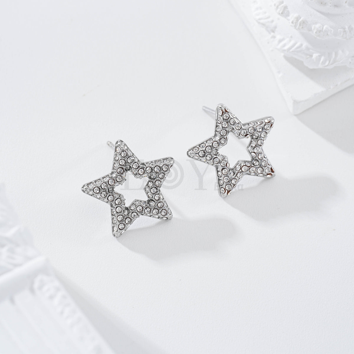 Pendientes estrella con circonitas acero
