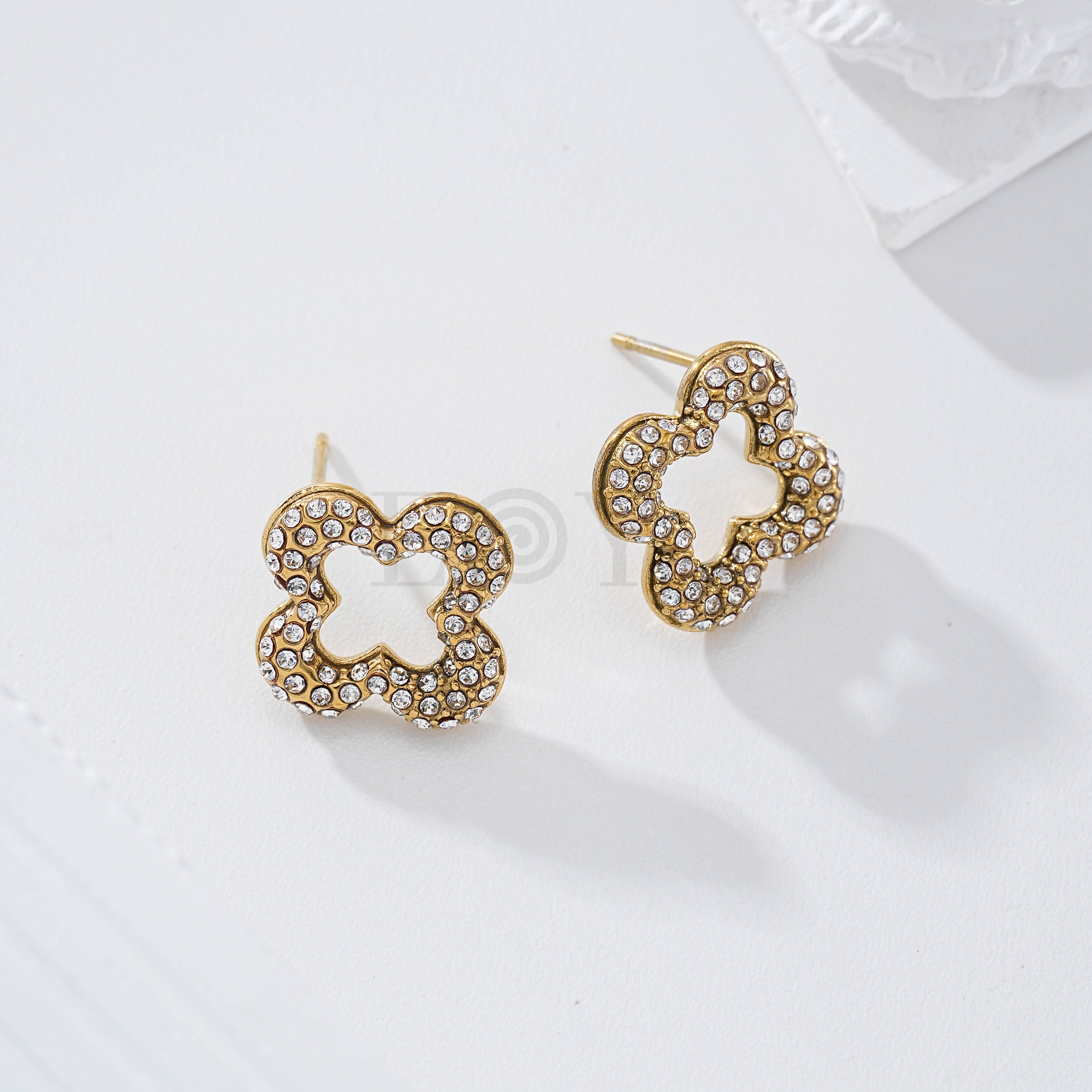 Pendientes flor circonitas acero