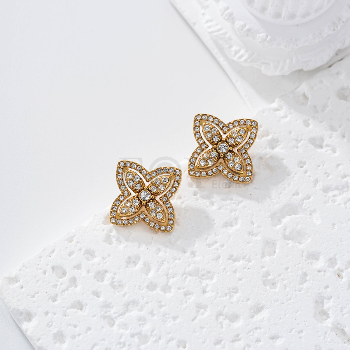 Pendientes flor circonitas acero