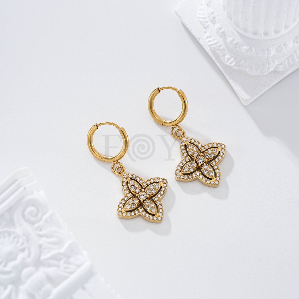 Pendientes flor circonitas acero