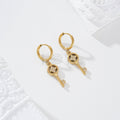 Pendientes de aro con llave circonitas acero