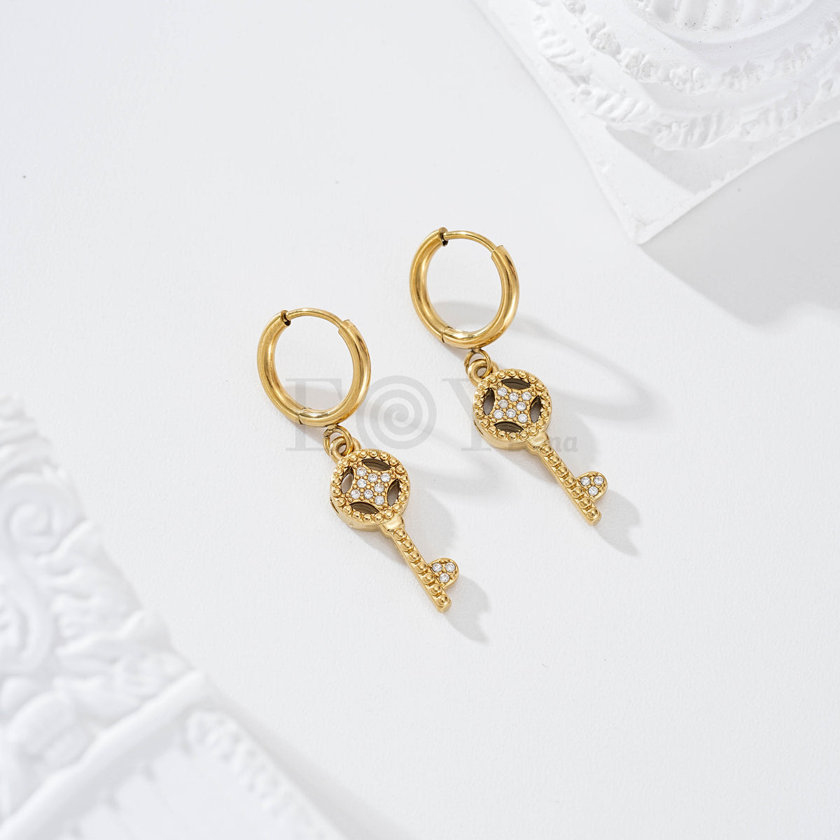 Pendientes de aro con llave circonitas acero
