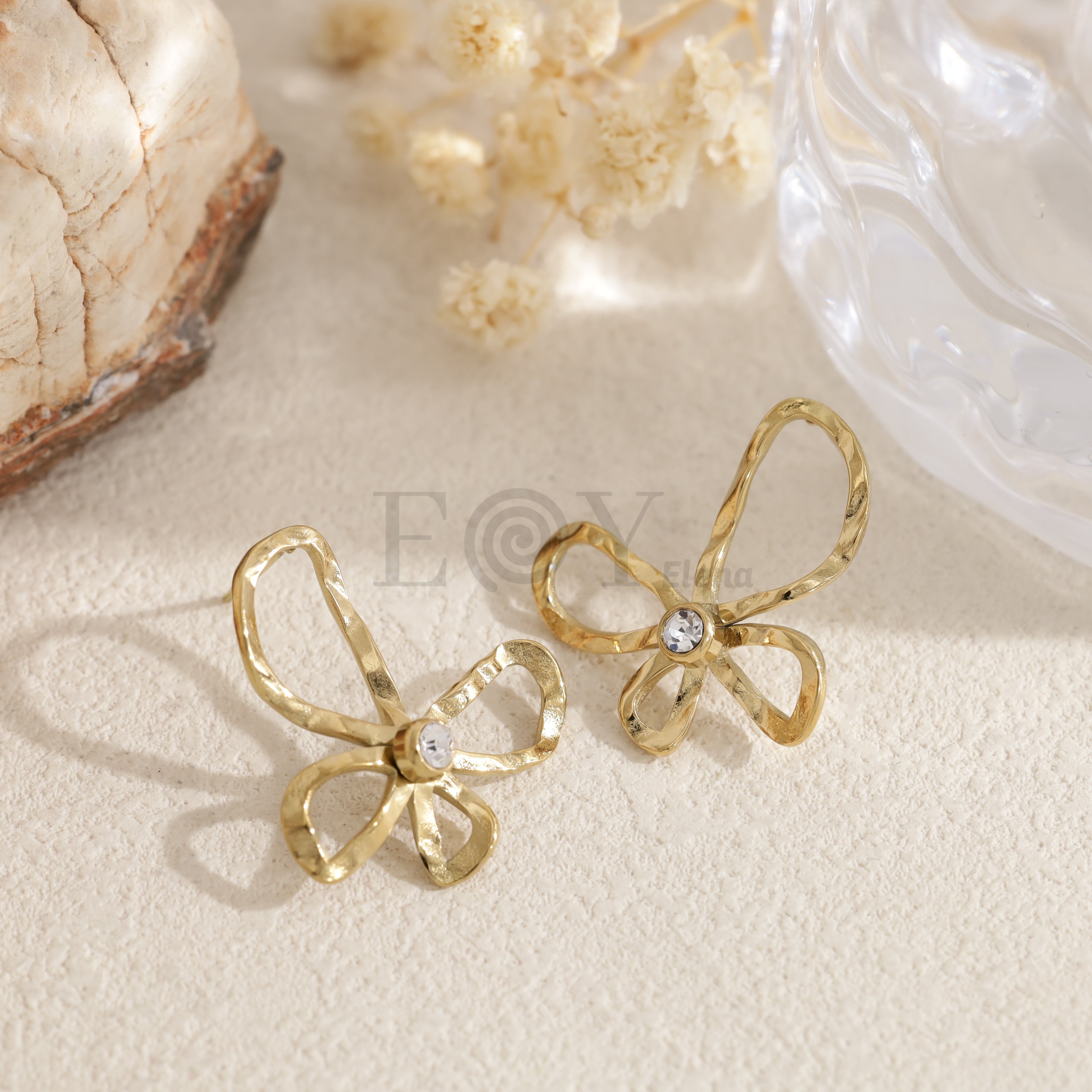 Pendientes lazo dorado con circonita