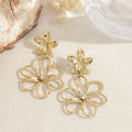 Pendientes flor dorada doble