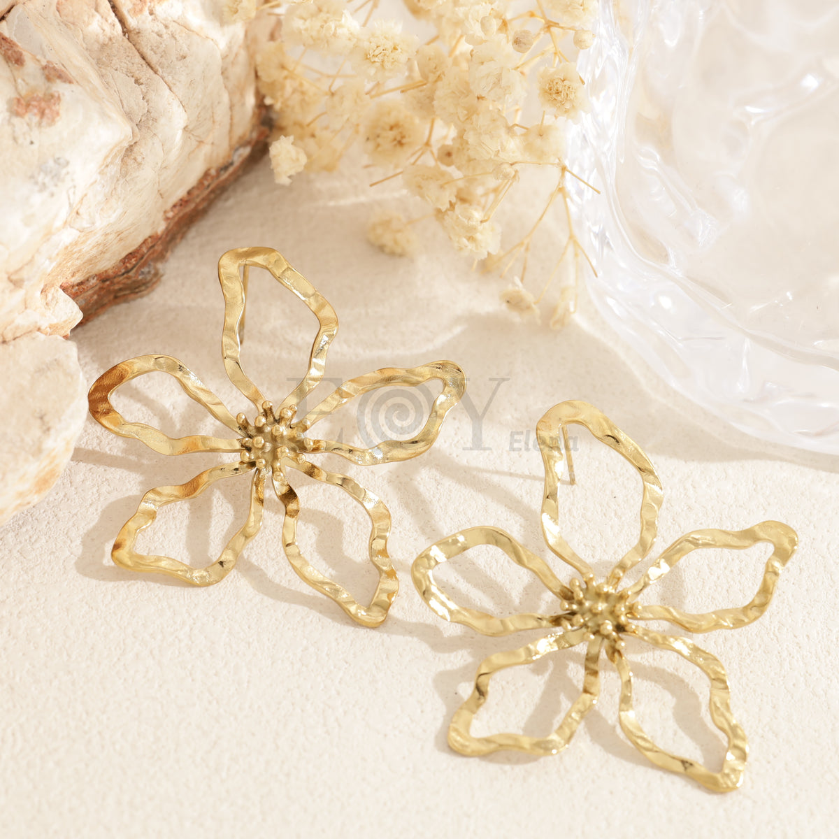 Pendientes flor calada acero