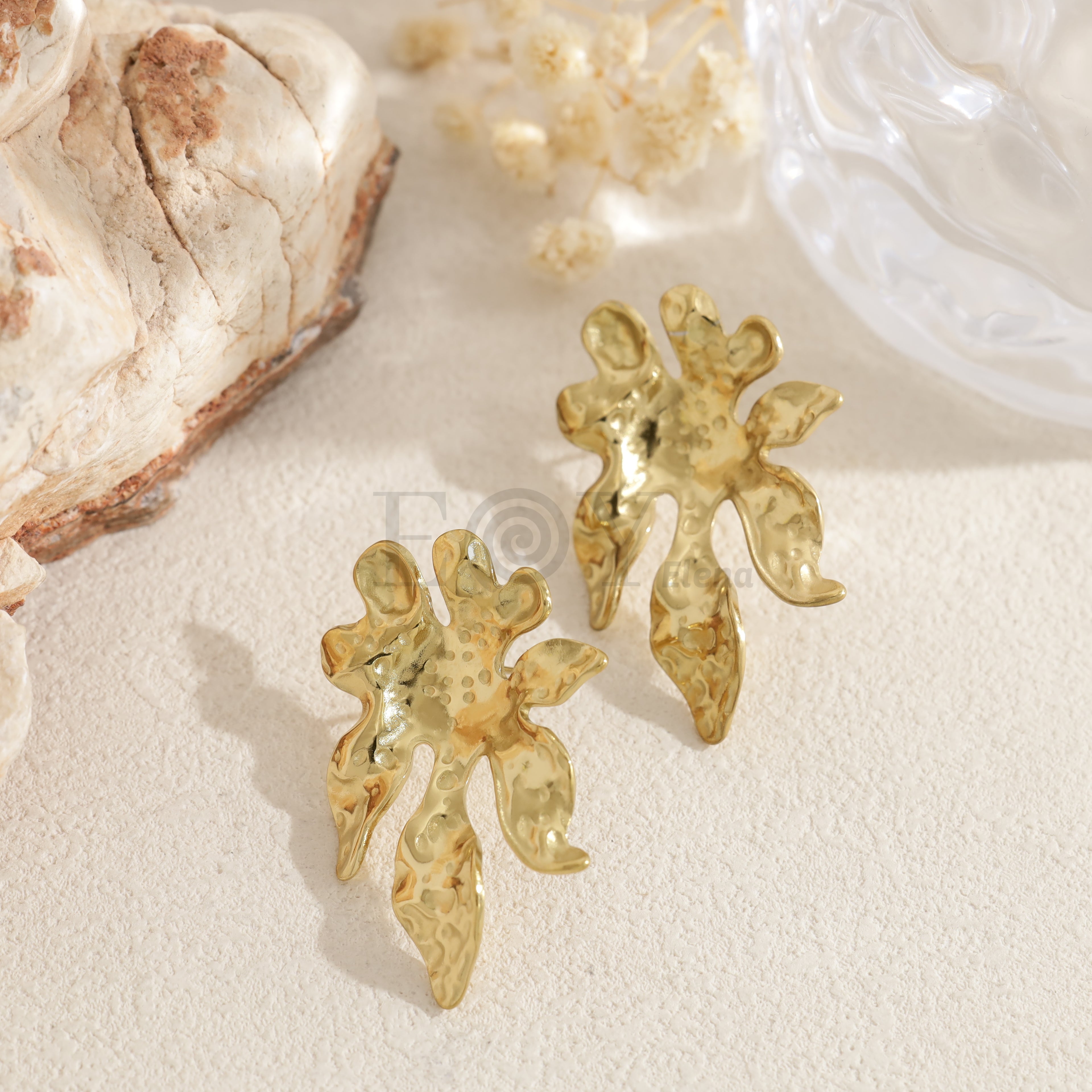 Pendientes flor alargada dorada