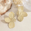 Pendientes flor de tres pétalos dorados