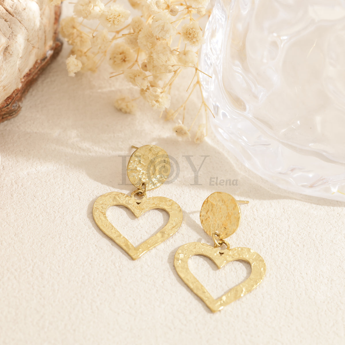 Pendientes corazón hueco acero