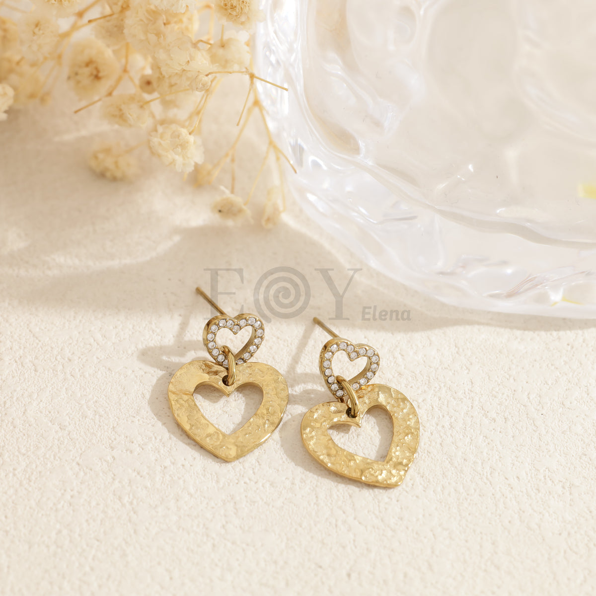 Pendientes doble corazón hueco acero