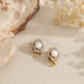 Pendientes flor con perla central y circonitas