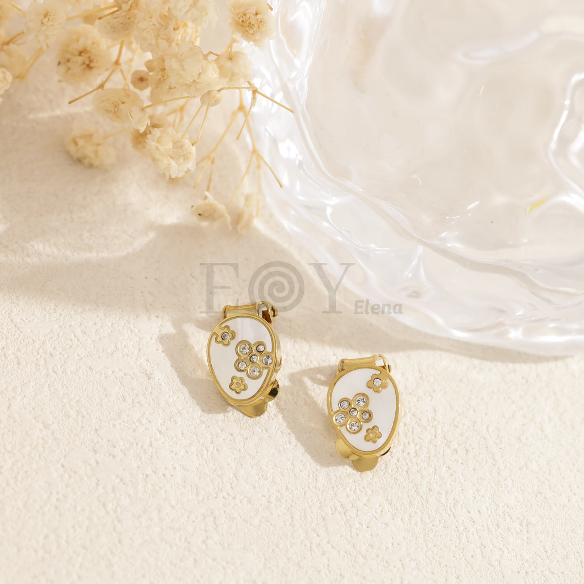 Pendientes con detalle blanco pinza acero