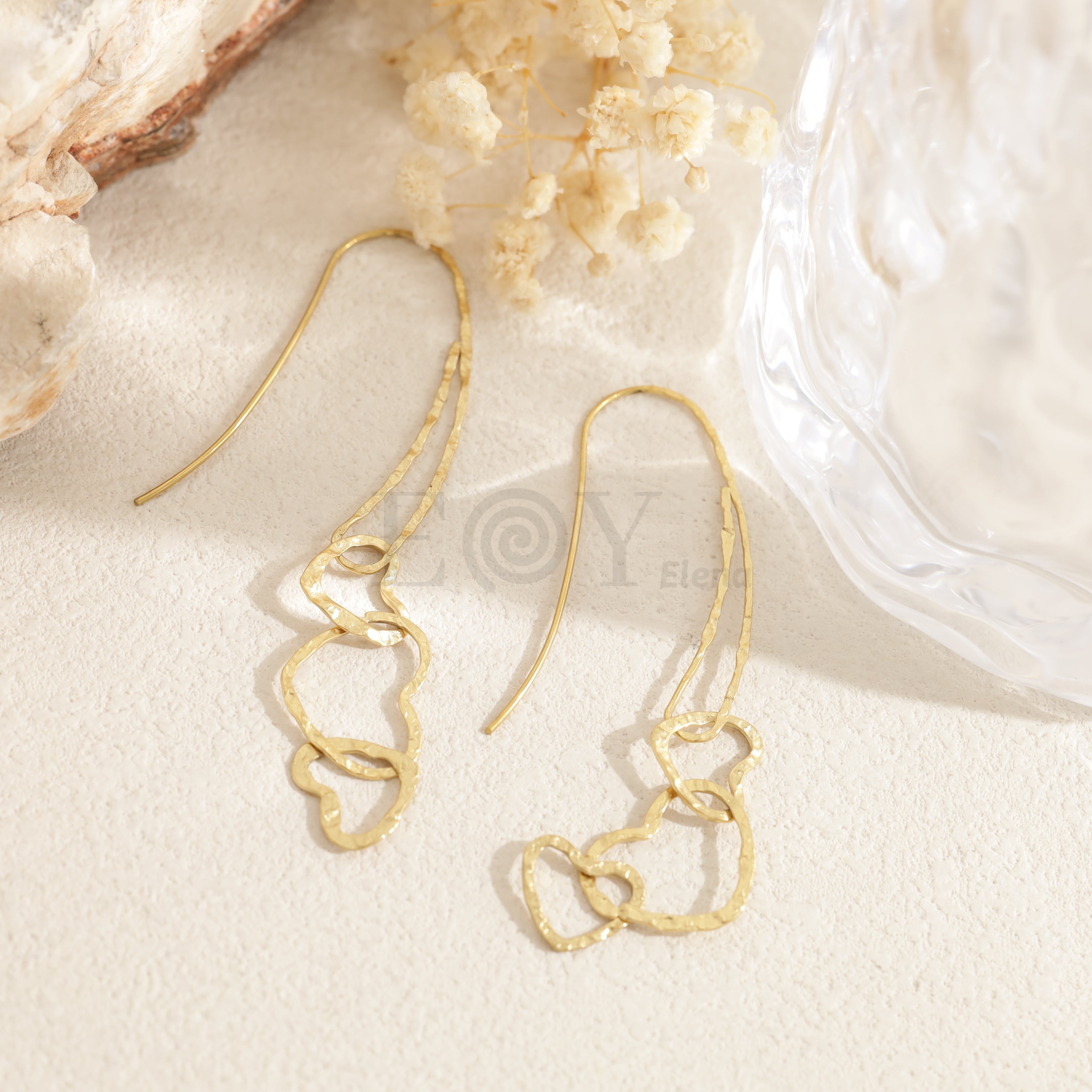 Pendientes largos triple corazón