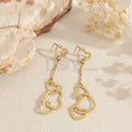 Pendientes largos triple corazón