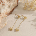 Pendientes corazones colgantes dorados