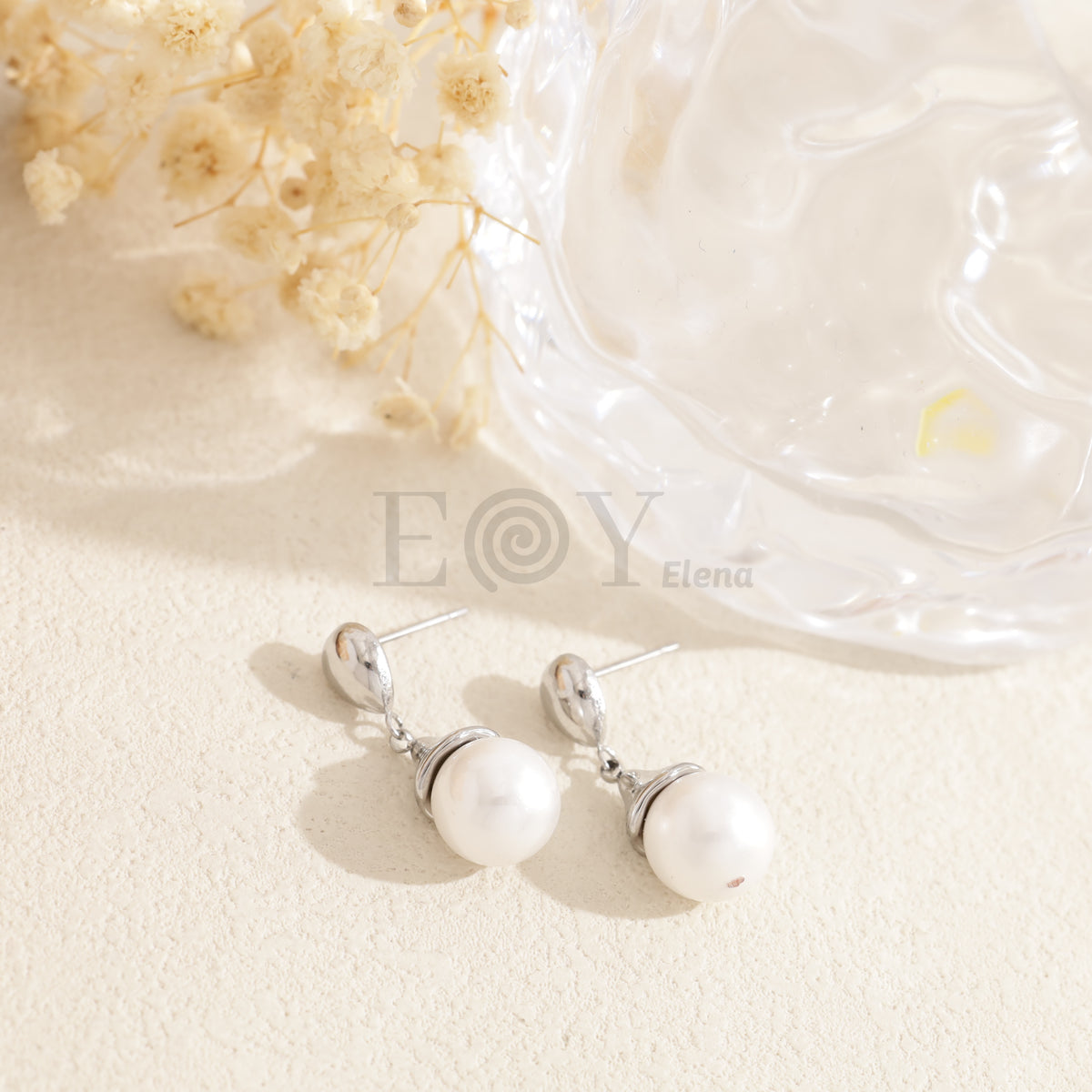 Pendientes con perla acero