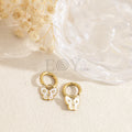 Pendientes mariposa blanca acero