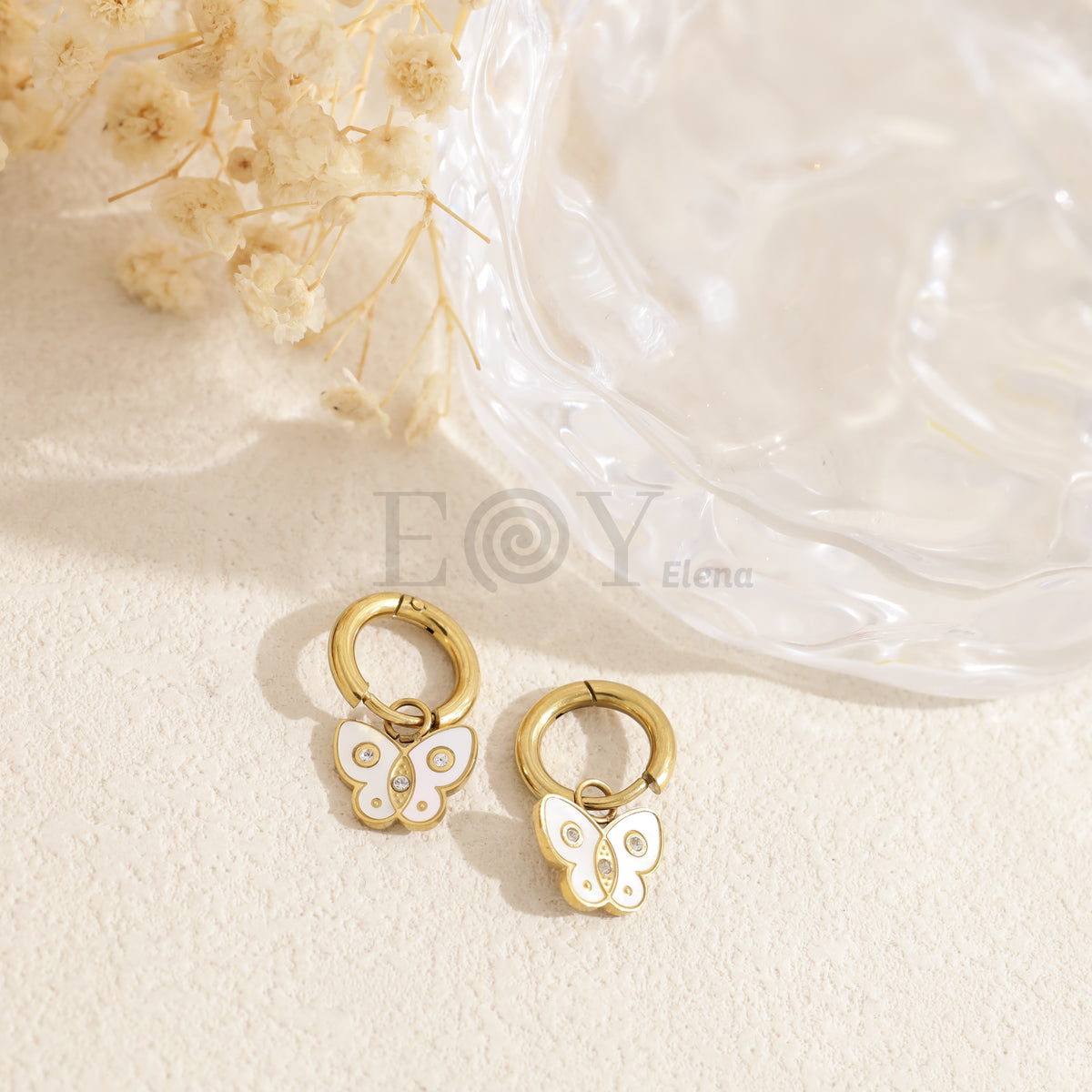 Pendientes mariposa blanca acero