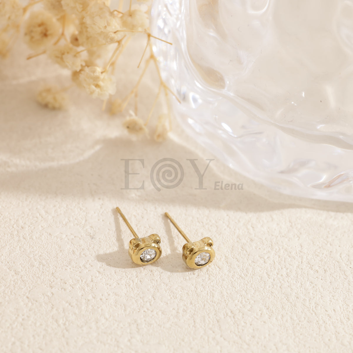 Pendientes osito circonita acero