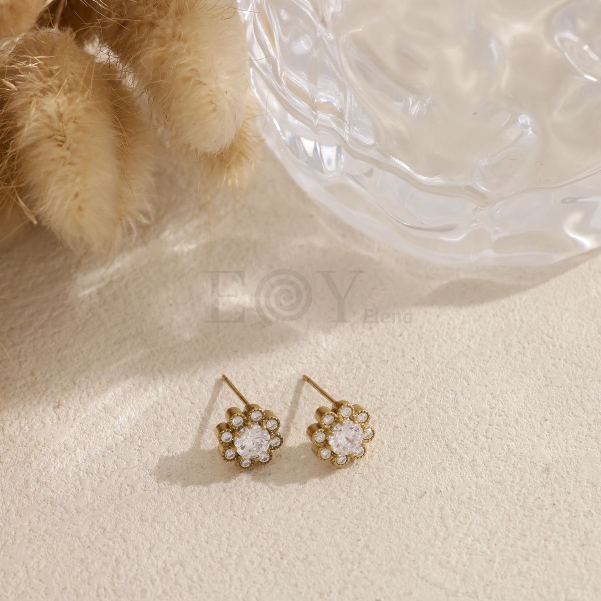 Pendientes flor piedra acero