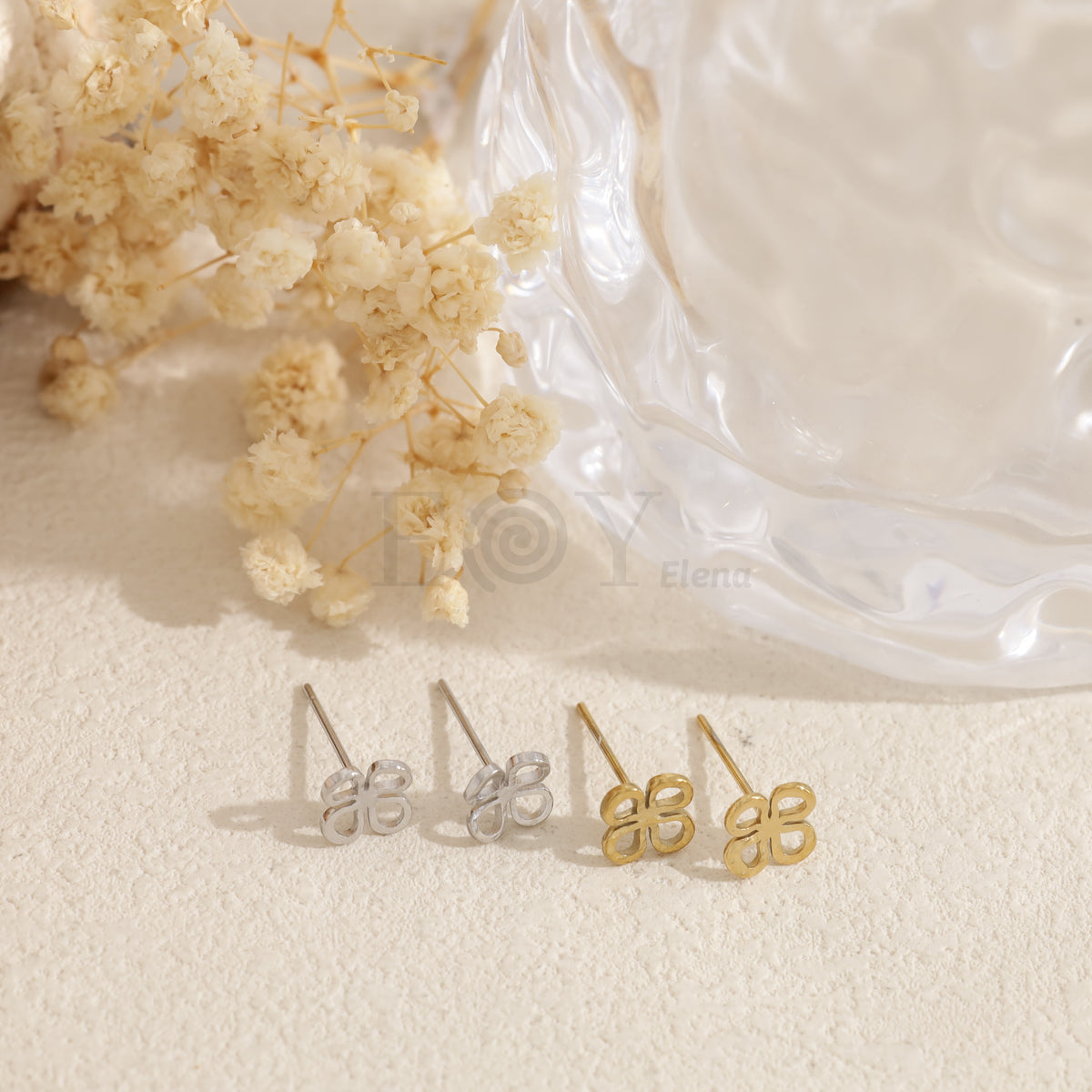 Pendientes flor simple acero