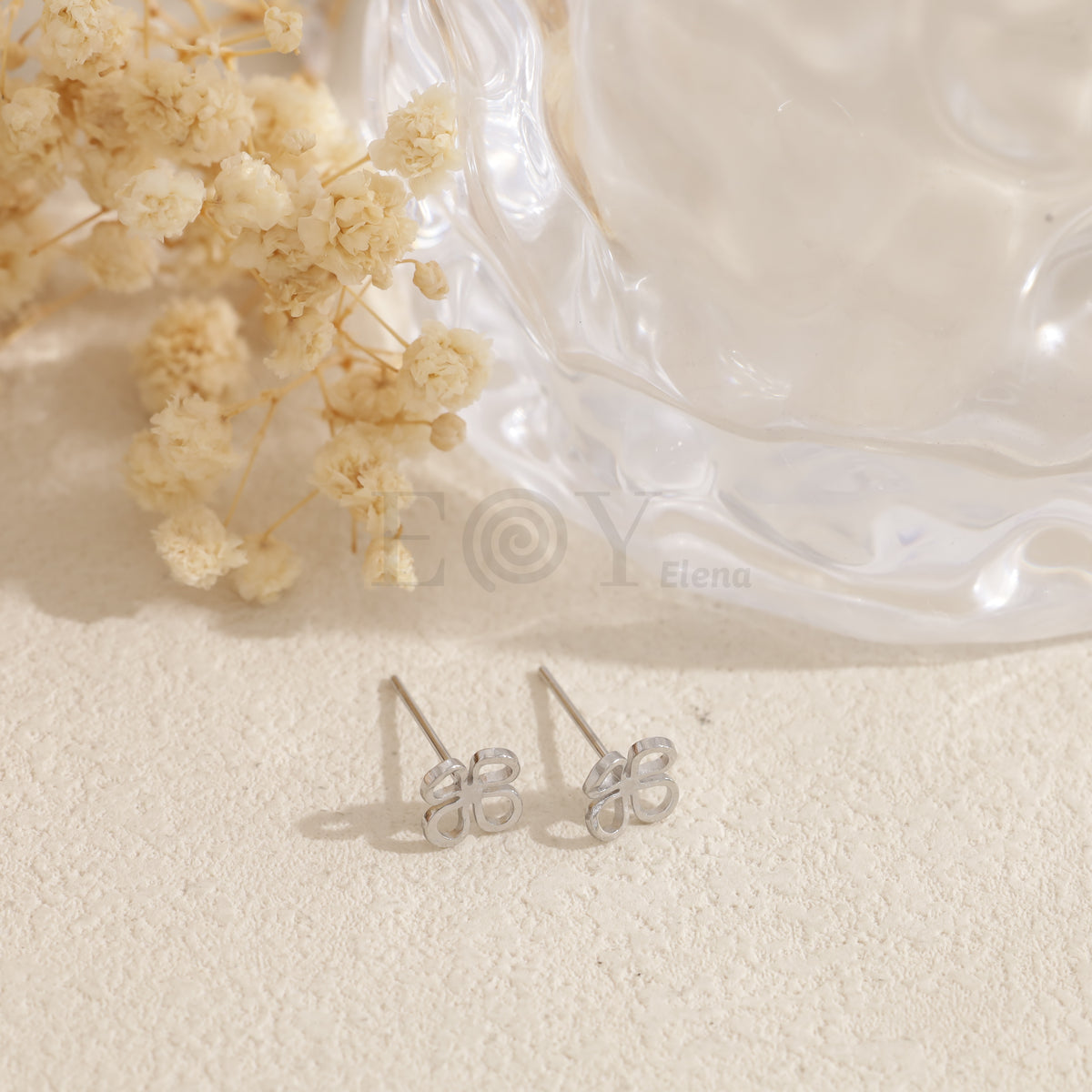 Pendientes flor simple acero