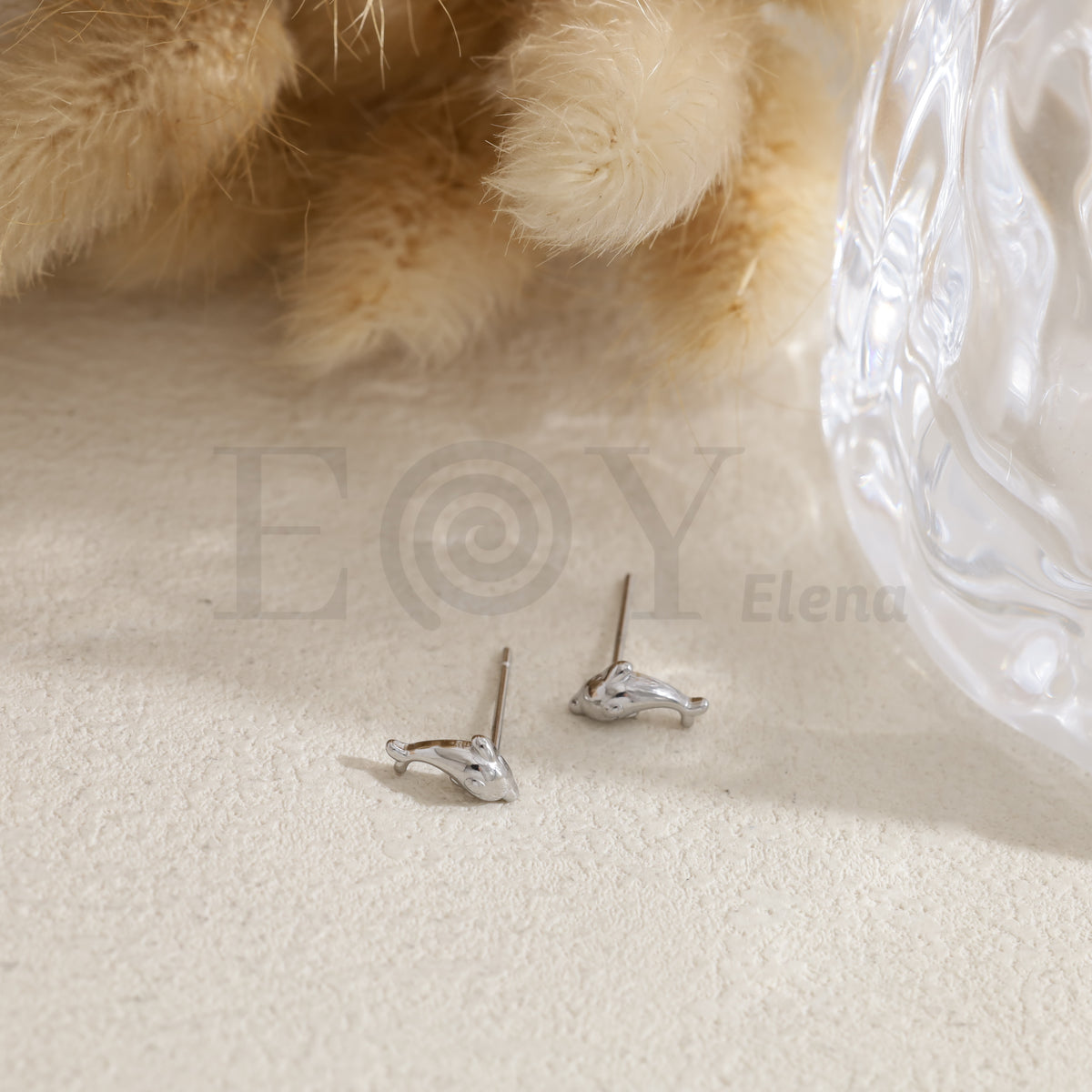 Pendientes delfín acero