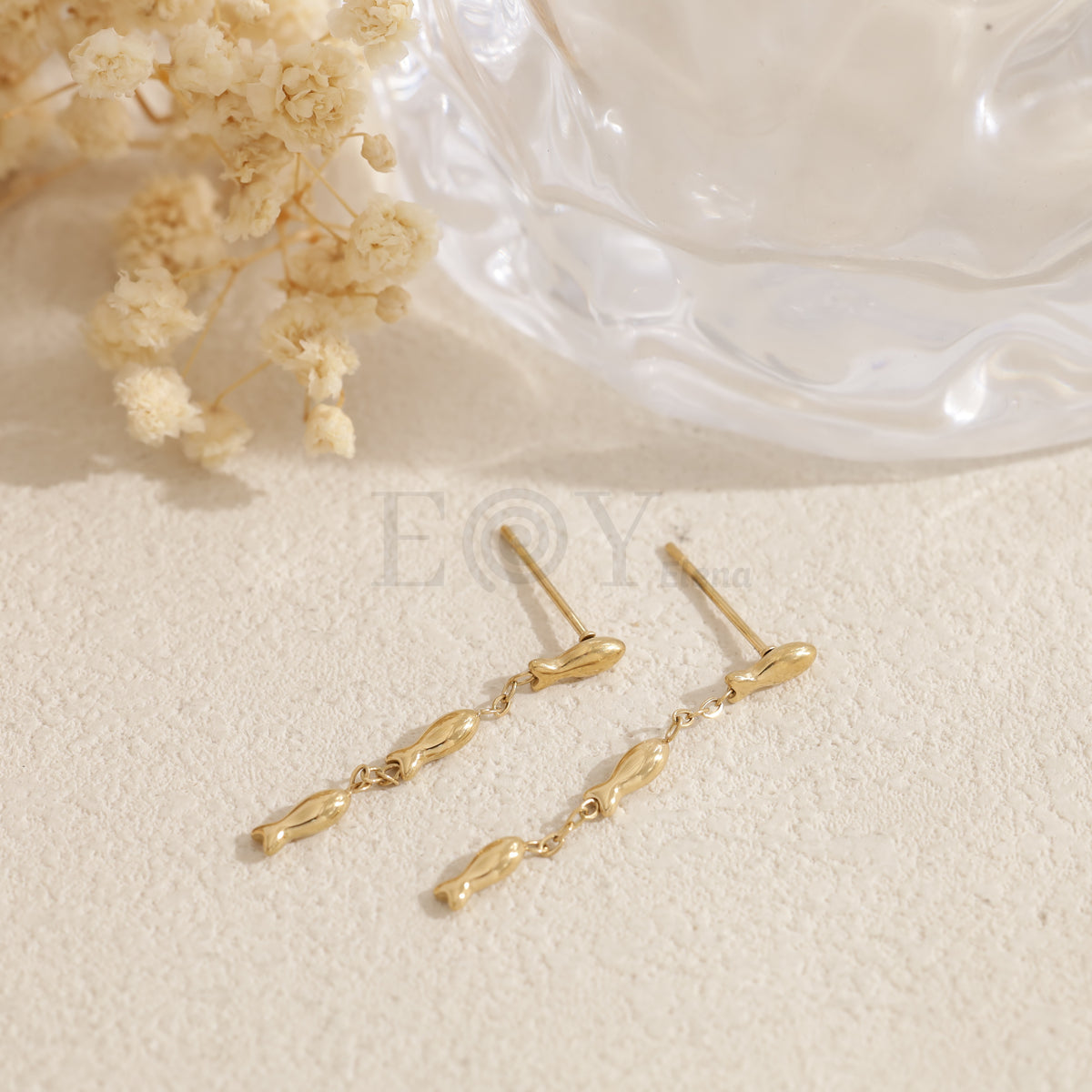 Pendientes largos triple pez acero