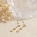 Pendientes largos triple flor acero