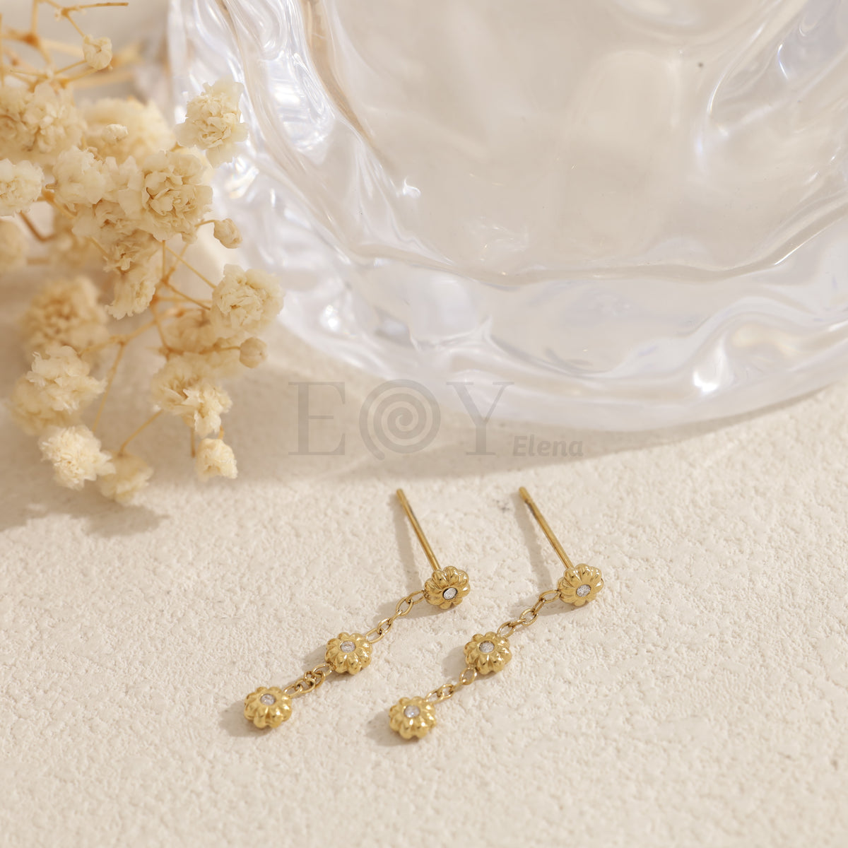 Pendientes largos triple flor acero