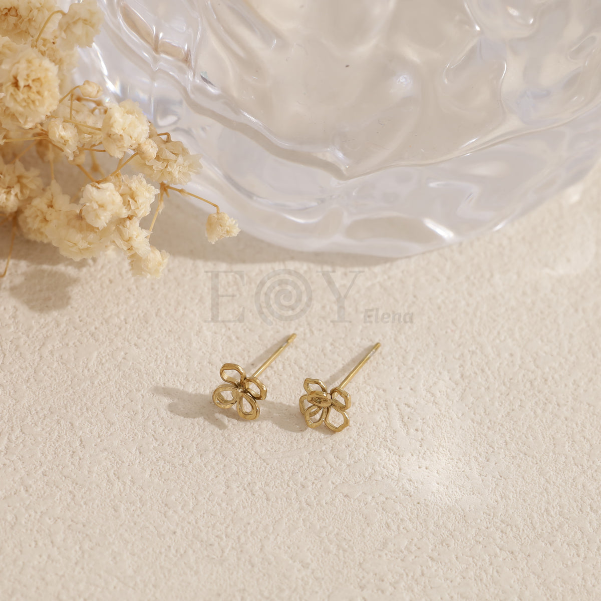 Pendientes flor simple acero